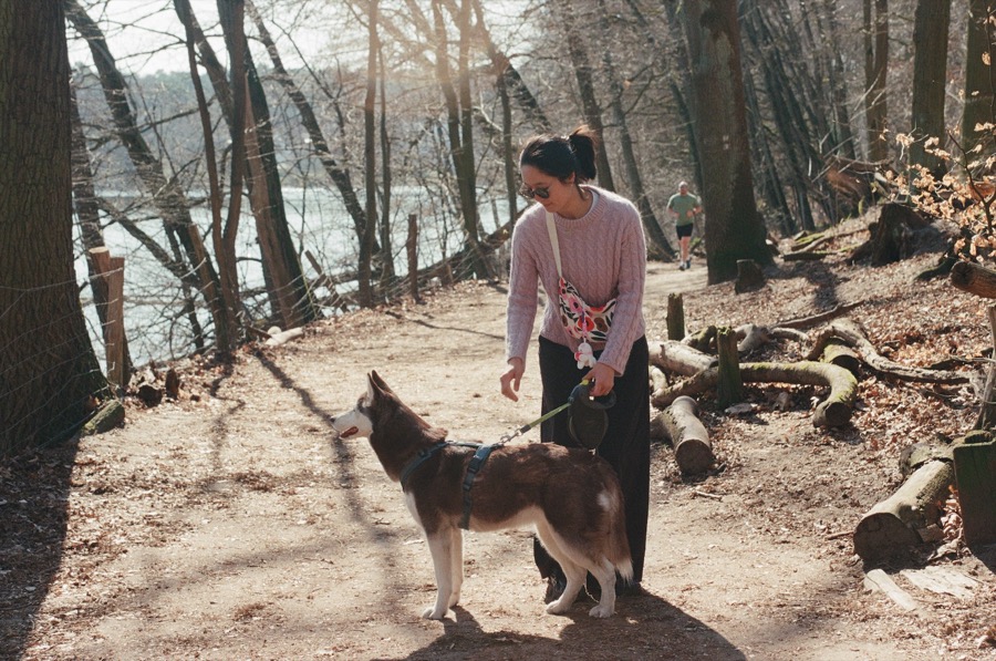 Knotty's developer walking her dog Nessa in the woods